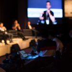 Panel,Speaker,On,Stage,Presenting,Vision,And,Ideas.,Conference,Lecture
